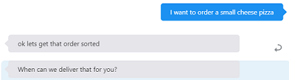 Screenshot showing the digital assistant tester. After the user input ('I want to order a small cheese pizza') is the DA's response ('ok lets get that order sorted' followed by 'When can we deliver that for you?')